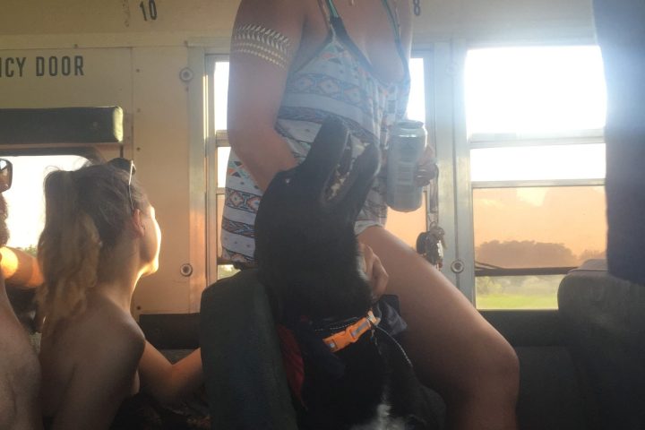 a man and a woman standing in front of a mirror